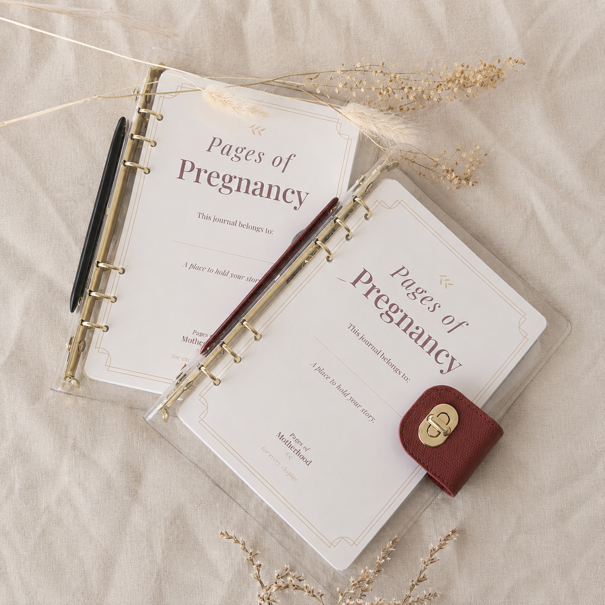 Customisable pregnancy journal with interchangeable pages and A5 six-ring binder, shown in two colour options.